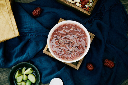 Traditional Laba Congee with Red Beans and Fresh Vegetables