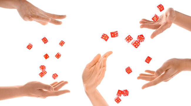 Female hand throwing red game dices on white background