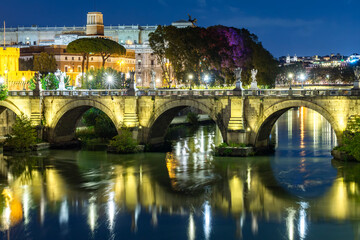 Fototapeta premium St. Angel bridge over Tiber river at night, Rome, Italy
