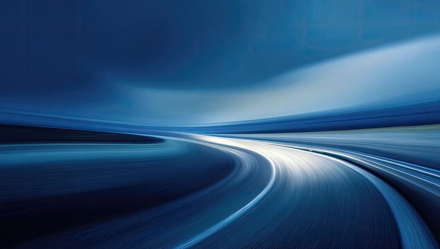 Motion blur on a highway at dusk, curves into the distance