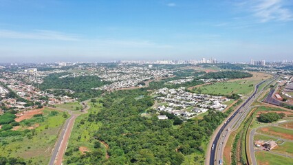 Obraz premium Panoramic view of luxury residential condos with lots of green areas and tropical forests in Goiania, Goias, Brazil 