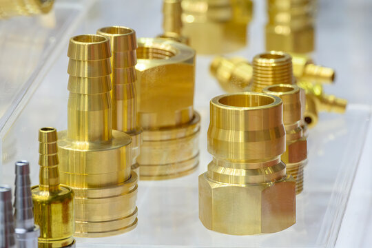 Industrial brass quick release couplings (QRC) for pneumatic and hydraulic fluid power systems featuring precision-machined threads.