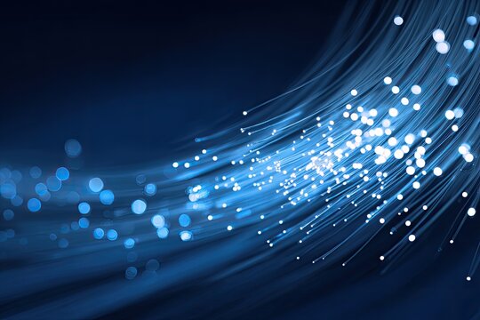 Abstract glowing fiber optics threads against dark blue background
