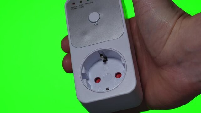 Voltage monitoring relay for electrical protection isolated on green background