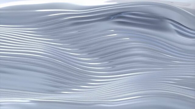 Smooth flowing silver waves creating a dynamic and modern abstract background. Ideal for showcasing elegance and sophistication in design projects