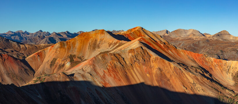 This scenic San Juan Mountain panorama features colorful Colorado 12er Red Mountain #3 in soft light at sunrise.