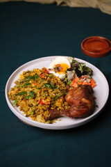 Fototapeta premium Delicious fried rice with chicken and fresh salad on white plate