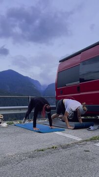 Fitness Stretching Routine in Mountains

Couple performing stretching workout outdoors with alpine scenery, healthy lifestyle, travel fitness concept.