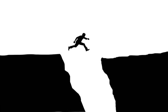 Taking the Leap: A silhouetted figure fearlessly leaps across a chasm, embodying courage, risk-taking, and the pursuit of goals.