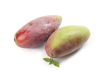 Fresh Hainan Toffee Mangoes with Mint Leaf on White Background © LamHuong