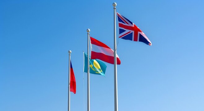 Multiple National Flags Waving in the Wind Against a Clear Blue Sky