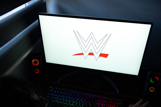 Punta Arenas, Chile &ndash; March 07, 2026: A desktop PC monitor showing the world wrestling entertainment (WWE) logo on a white background with RGB peripherals