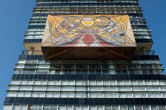 A vibrant David Alfaro Siqueiros mural adorns a Iconic building in the National Autonomous University of Mexico