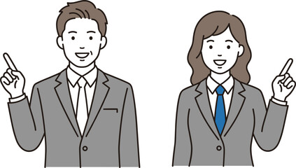 Two smiling people in gray suits pointing upwards with one finger each