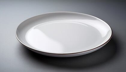 empty white ceramic dinner plate on plain background for food presentation