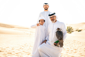 Three generation family making a safari in the desert of Dubai