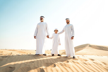 Three generation family making a safari in the desert of Dubai