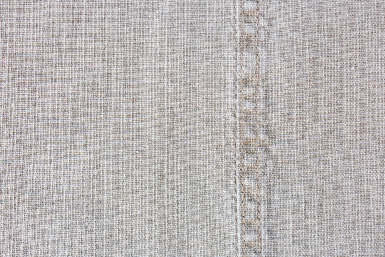 Linen textile with stitched seam macro sewing detail
