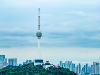 Obraz premium Wuhan TV Tower on the Hill with City Skyline Aerial View