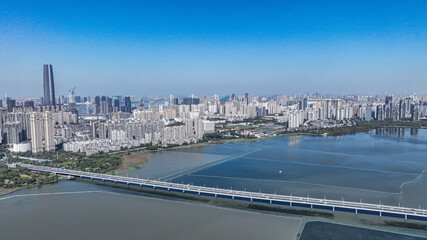 Wuhan City Aerial Panorama with Modern Skyline and Waterside Bridge © LeVan