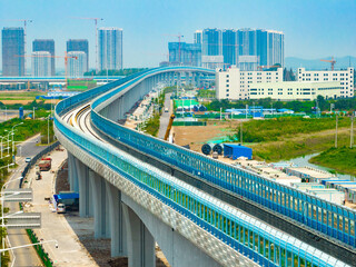 Wuhan Elevated Metro Track Construction Phase with Modern Skyline © NguyenMinh