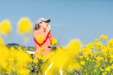 woman suffering from pollen allergy while  training outdoors