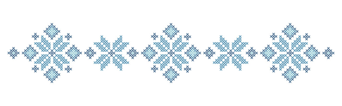 The pattern is embroidered with a cross stitch. Traditional Ukrainian ornament with flowers.