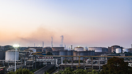 Obraz premium Industrial Factory Complex at Sunrise