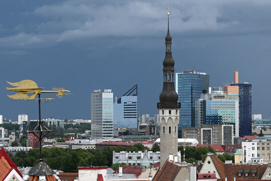 Tallinn, Estonia - July 24, 2024: Medieval and modern buildings in Tallinn, Estonia.