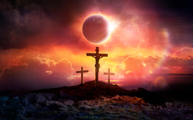 Crucifixion of Jesus Christ in Hill At Sunset Eclipse And Abstract Lights Flare Effects …and...