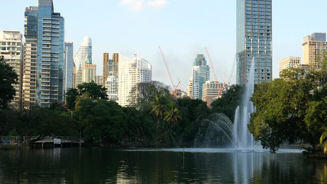 Bangkok skyline and city public park 