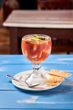 Traditional Mexican Shrimp Cocktail or coctel de camaron with Avocado, Lime and Crackers