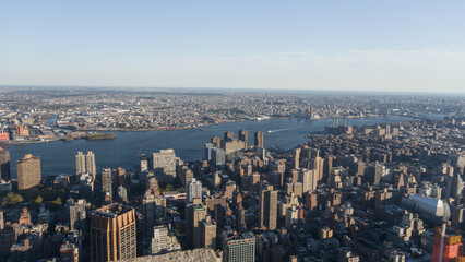 Aerial View of Manhattan with East River and Surrounding Boroughs