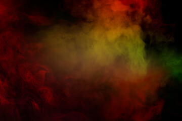 Fototapeta premium Yellow steam on a black background.