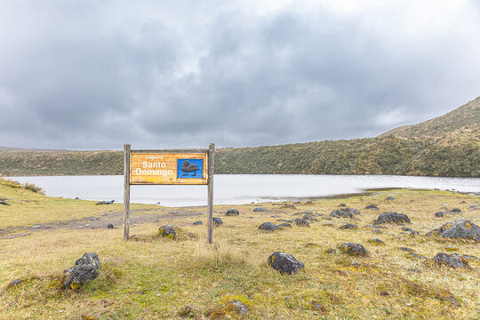 Cotopaxi National Park, Ecuador &ndash; February 5, 2026: Sign with the name Laguna de Santo Domingo, located at the foot of the Cotopaxi Volcano, an ideal place for cycling and taking photographs.