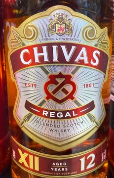 Saint Petersburg Russia March 4th 2026 Bottle of whiskey on the shelf at the store Chivas