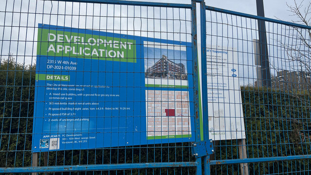 City of Vancouver development application sign at 2315 W 4th Ave, Kitsilano, proposing mixed-use building with grocery store