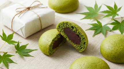 Momiji Manju, Japanese sweets Matcha buns with red bean filling arranged with gift box and maple leaves