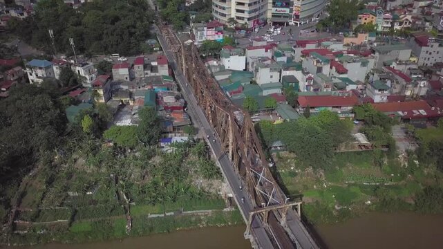Aerial footage showing the iconic long bien bridge and urban landscape of hanoi, vietnam