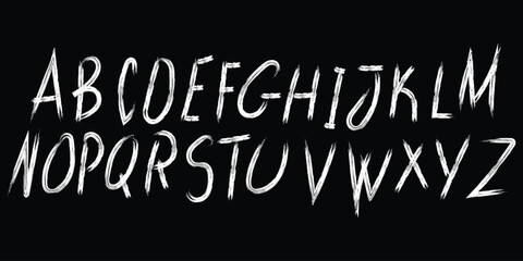 Obraz premium White Brush Stroke Alphabet Letters on Black Background