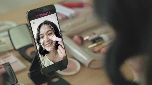 Asia people young gen z female happy smile enjoy phone apply selfie screen makeup blush virtual AI tech scan face app AR mixed augmented reality future beauty smart iot skin care help guide advice.