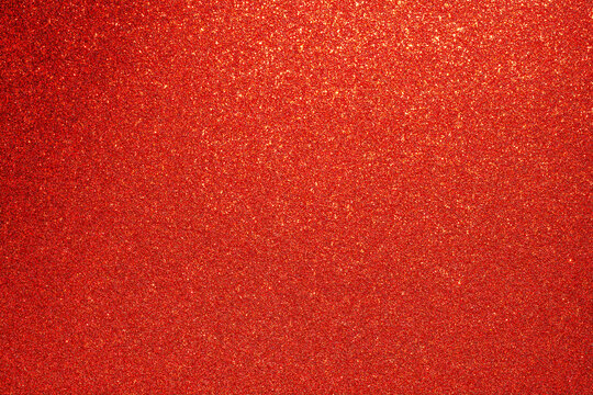 A red background with a lot of red dots