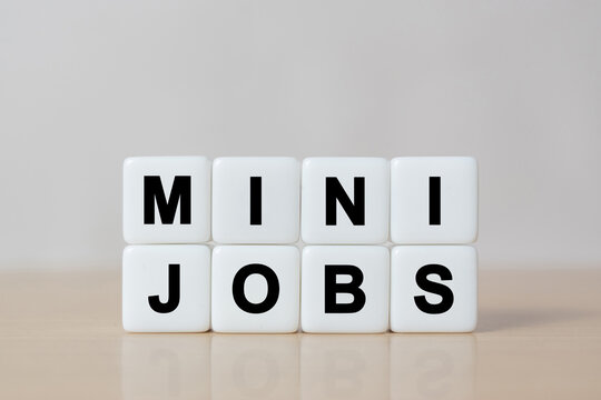 Mini jobs concept on dice