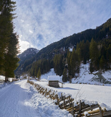 Beautiful winter hike in the Hollersbach Valley, in the Salzburg region near Bramberg, Austria.