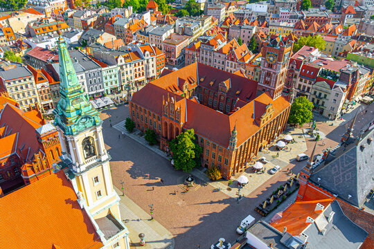 Aerial panoramic view of historical buildings and roofs in Polish medieval town Torun