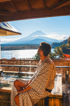 Traditional Japanese onsen with iconic Mount Fuji view