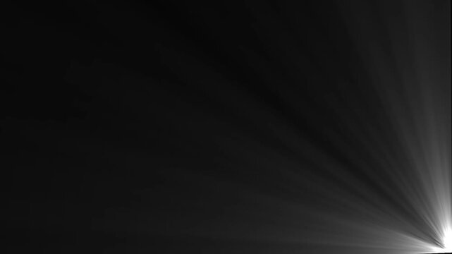Dynamic light rays shining through darkness