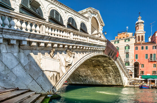 Rialto Bridge in Venice, Italy. The Rialto Bridge (Ponte di Rialto) is the oldest and most iconic bridge spanning the Grand Canal in Venice, Italy
