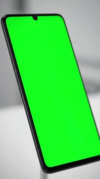 Abstract Technology Interface with 4k man using iphone 12 smartphone viewing green screen on phone press browsing chroma key online typing text reading social media close up hands 24 04 21 st
