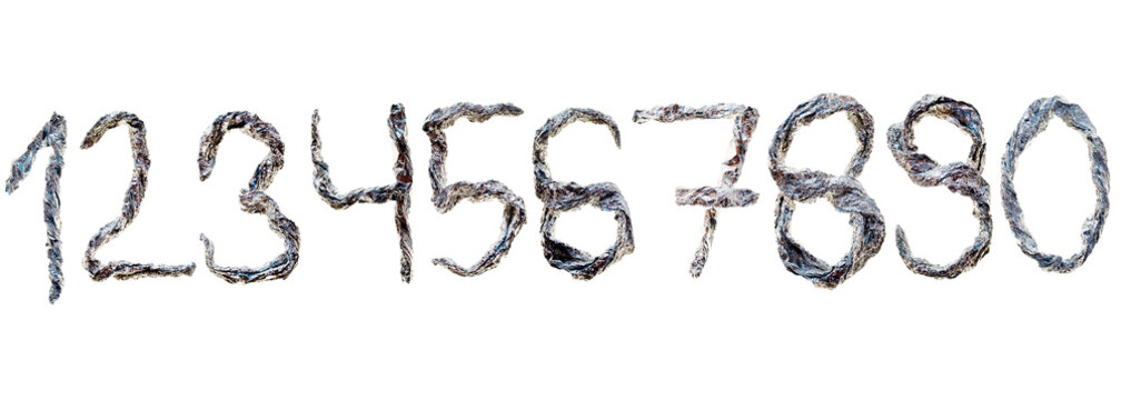 Numbers One Through Zero On White.Numbers Made From Crumbled Aluminum Foil.Numbers 1-0 Made of Textured Material.Shiny metallic numeric symbols isolated 